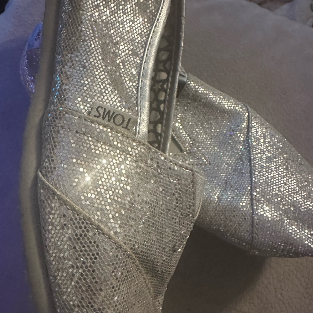 Women’s TOMS sparkle shoes in size 10